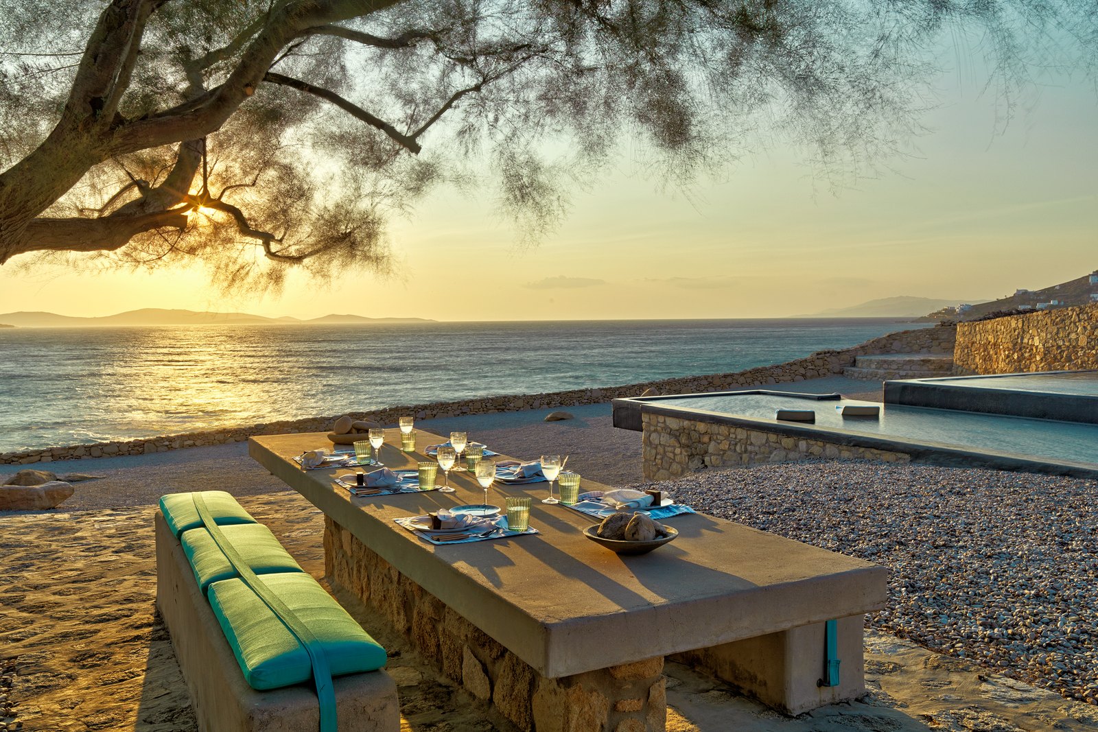Sunset dinner on the stone terrace under the tamarisk